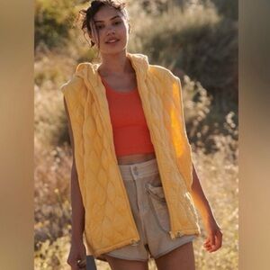 Free People Dream big puffer vest in pale marigold